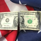 USA FATCA tax law - dollars and USA flag